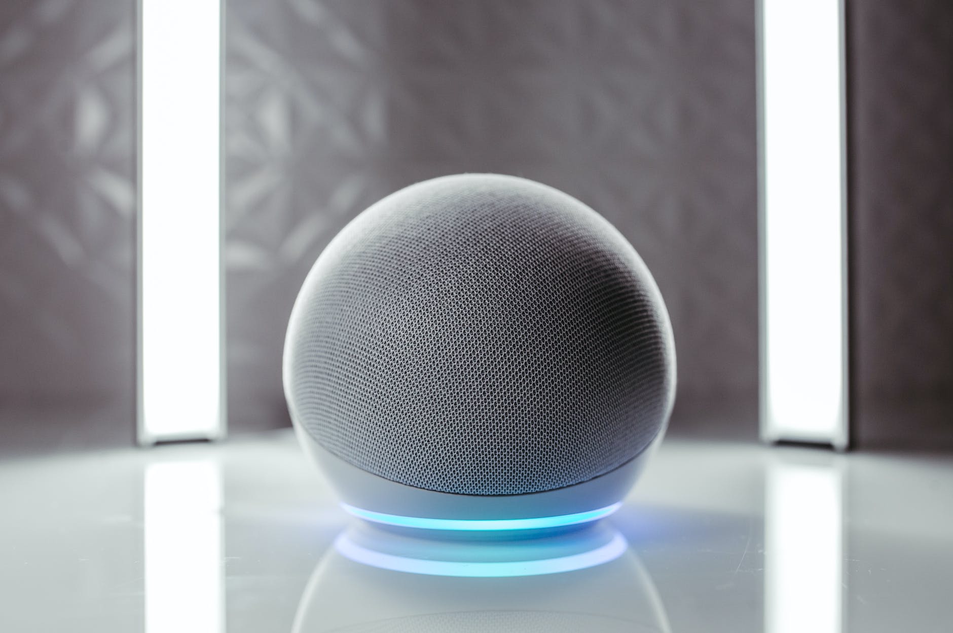 close up photo of gray round speaker